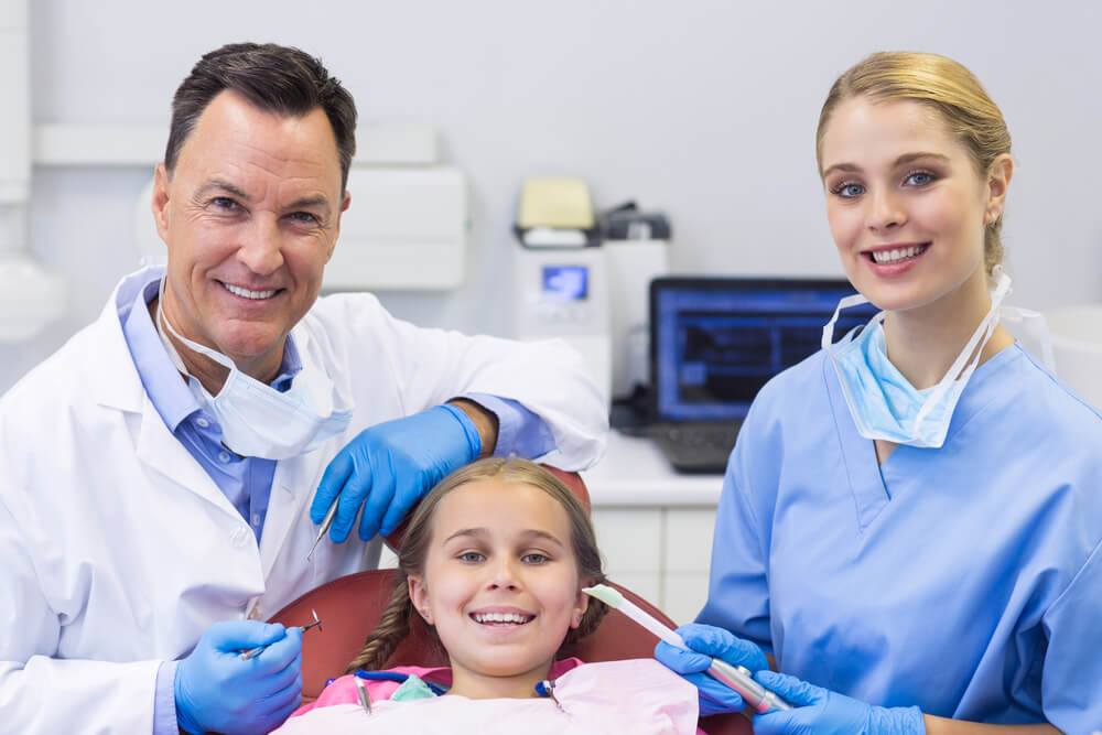 A Pediatric Dentist in Pearl City with his patient.
