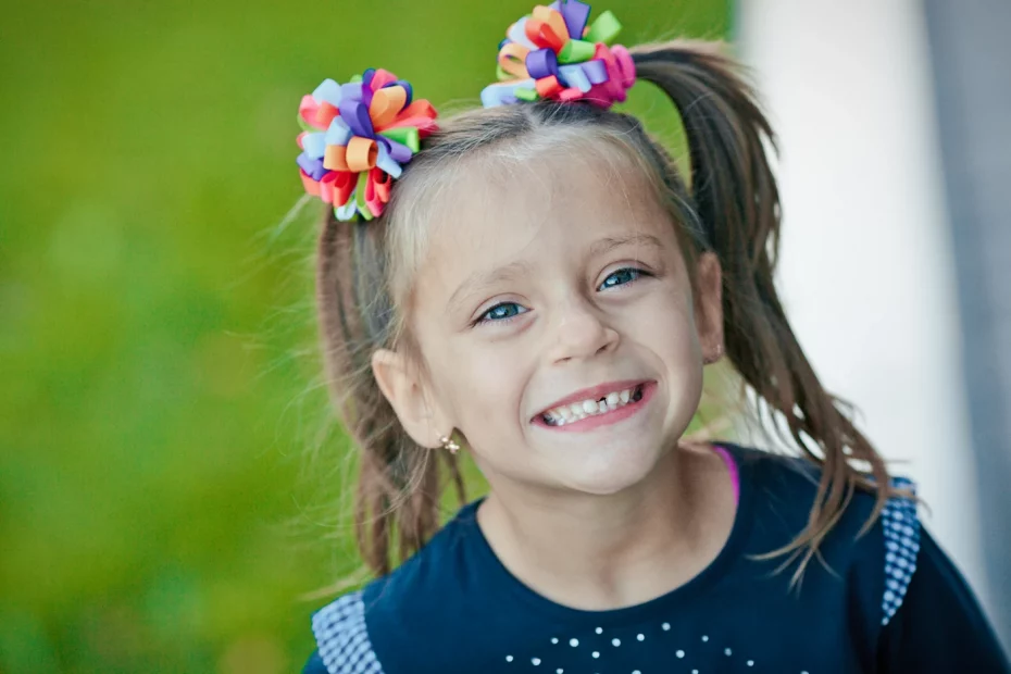 smiling-girl-with-missing-tooth-summertime