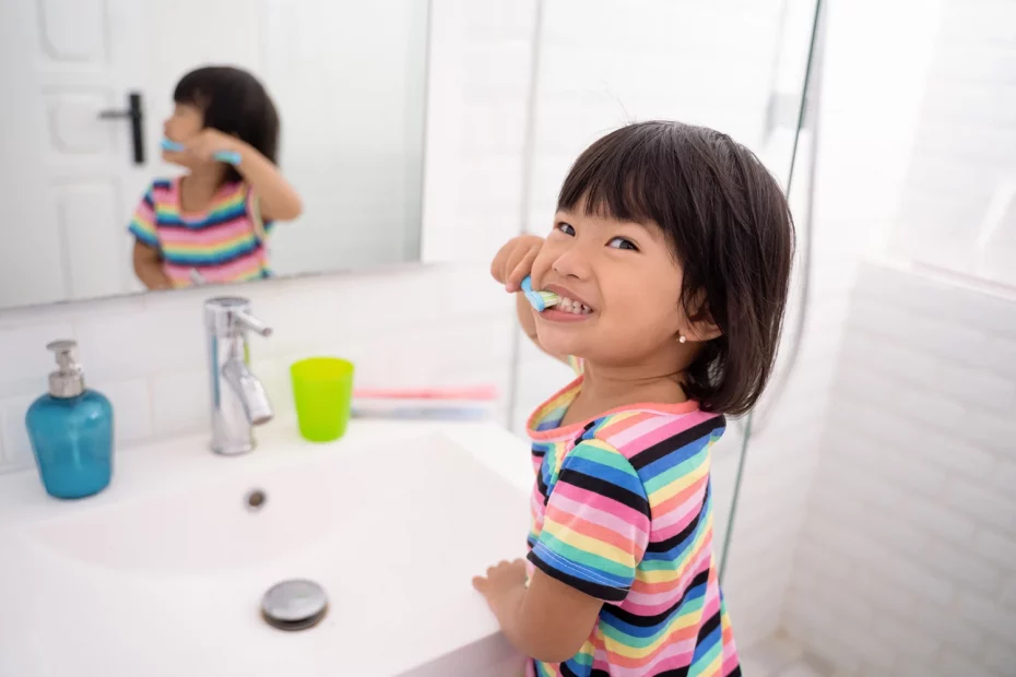 asian-little-girl-brushes-her-teeth-shows-her-teeth-when-brushing-her-teeth